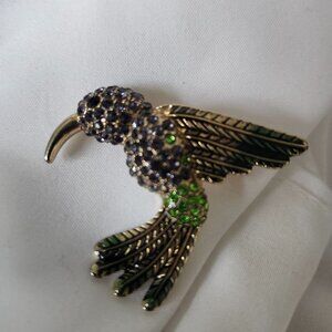 hummingbird brooch green gold and lavendar